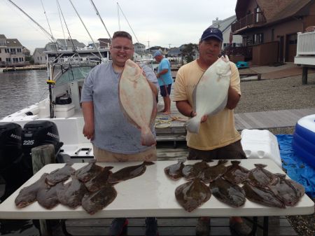 Greg_and_Sam_with_the_big_fish_of_the_day._Fish_were_in_the_4.5_to_5_pound_range.

JT_.jpg