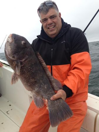 Angelo's_fish_looked_bigger_than_it_weighed._Very_long_fish,_but_only_was_11.5_lbs.jpg